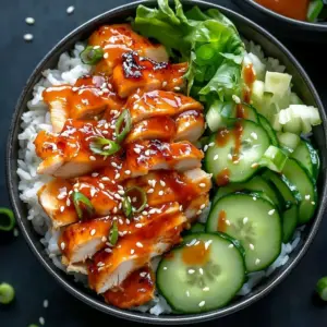 Creamy spicy chicken bowl with vibrant vegetables and a rich sauce
