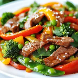 Delicious simple clean beef stir-fry served with vegetables and rice
