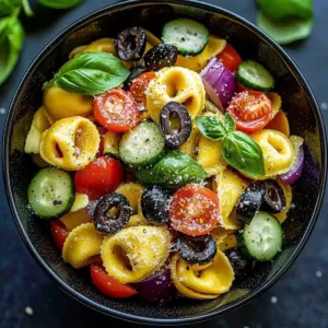 Colorful Sunny Tortellini Salad with fresh vegetables and herbs
